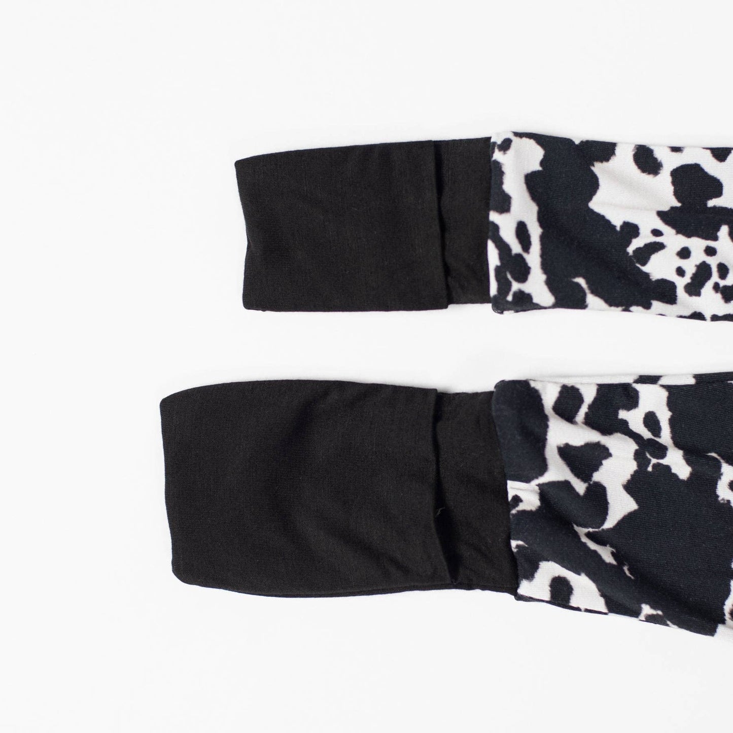 Cow Print Baby Zippy